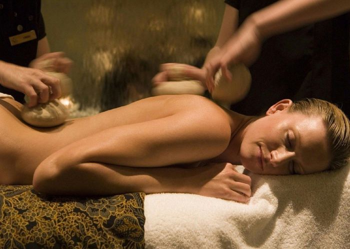  Woman enjoying hot stone massage at Lilianfels Day Spa, Katoomba