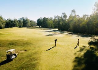 Tee off right alongside the river