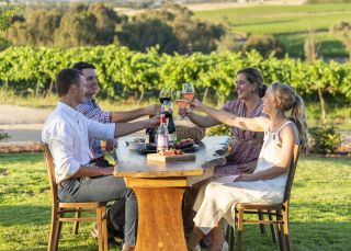 Friends enjoying wine tasting at Grove Estate Wines, Young