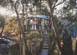 Couple enjoying the view from the Love Cabins, Blue Mountains