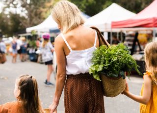 Family enjoying a visit to Yamba Farmers and Producers Market, Yamba