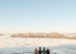 Group gazing at the scenic views from Olympian Rock Lookout, Blue Mountains National Park