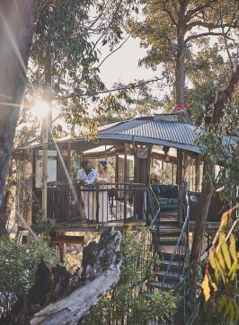 Couple enjoying the view from the Love Cabins, Blue Mountains