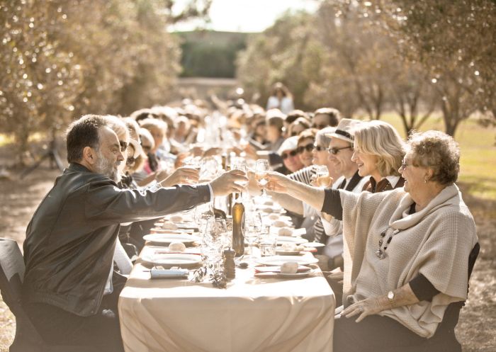 People enjoying the Olive Long Table Luncheon at Whispering Brook Winery in Broke, Hunter Valley