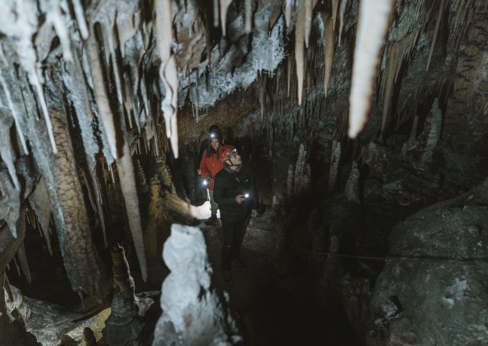 Couple touring the Yarrangobilly Caves in Kosciuszko National Park