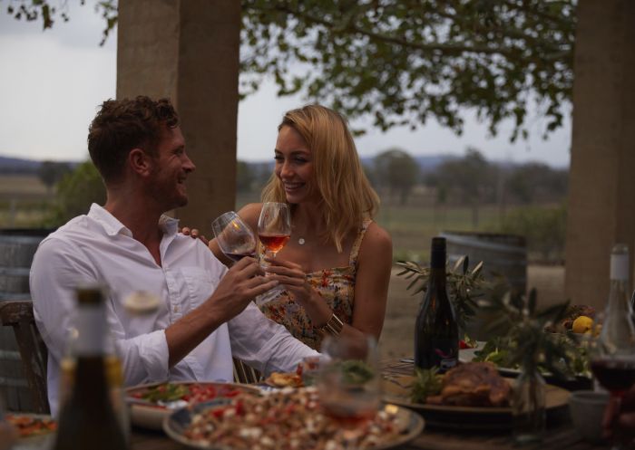 Couple enjoying food and drink at Wallington Wines, Nyrang Creek