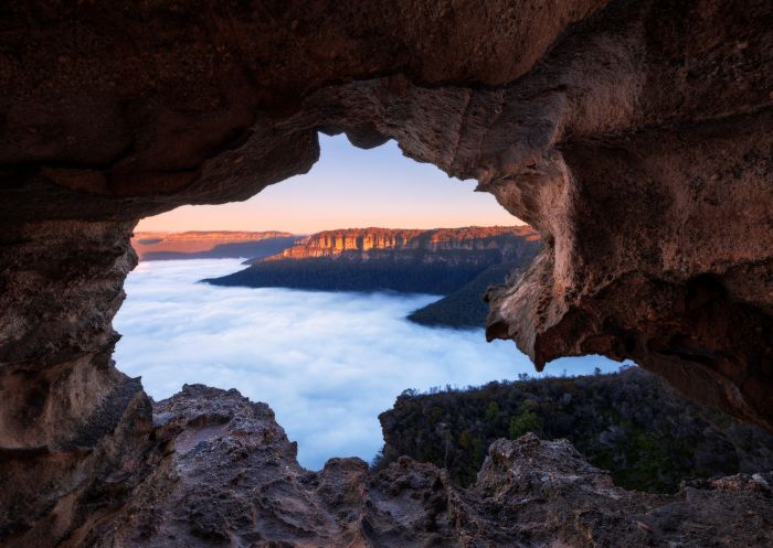 Morning fog over Blue Mountains National Park as seen from Lincoln's Rock in Wentworth Falls.