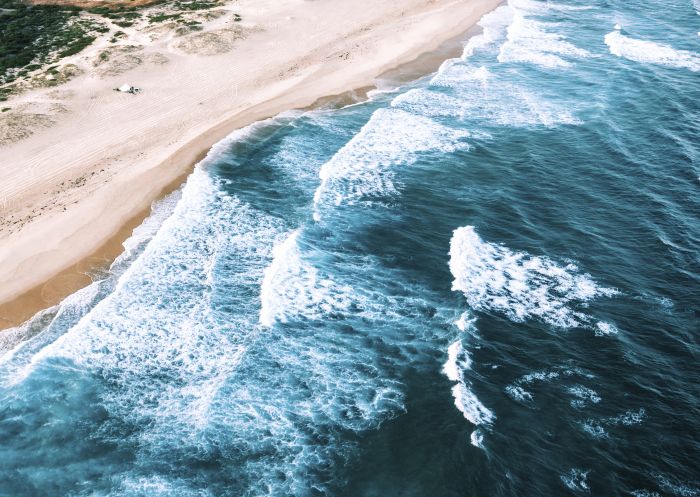 Aerial overlooking the scenic coastline and beaches near Lake Macquarie, North Coast