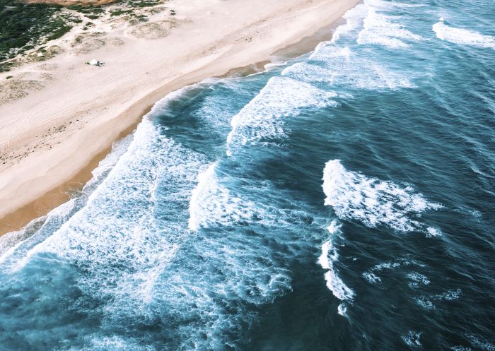 Aerial overlooking the scenic coastline and beaches near Lake Macquarie, North Coast