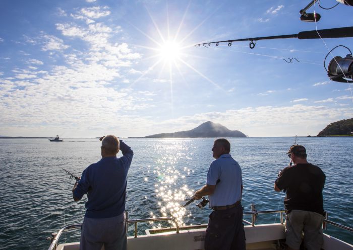 Men enjoying a day on the water fishing with Blue Fishing Charters, Port Stephens, North Coast