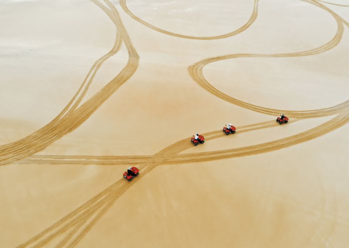 Quad biking experience on the Stockton Sand Dunes in the Worimi Conservation Lands, Port Stephens