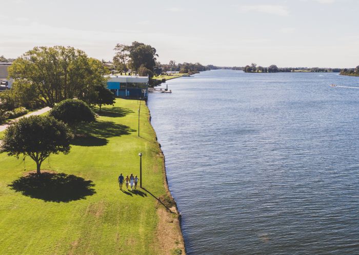 Family enjoying a self-guided walk on the banks of the Manning River along the Taree Heritage Walk, Taree