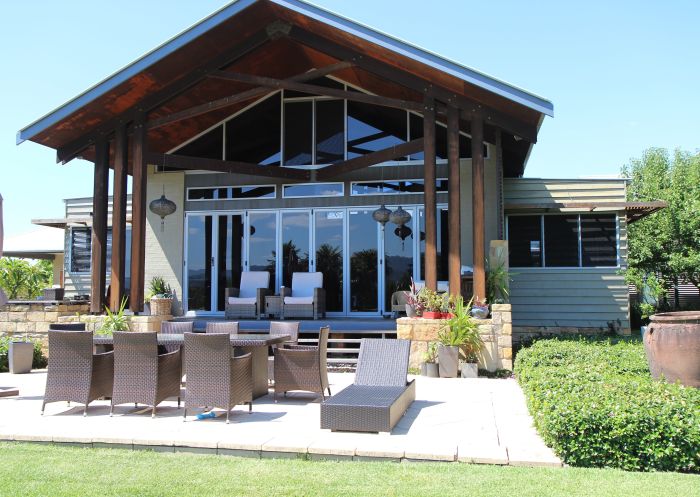 View of the sun drenched, north facing back terrace of Belvoir Pavilions Guest House, near Berry