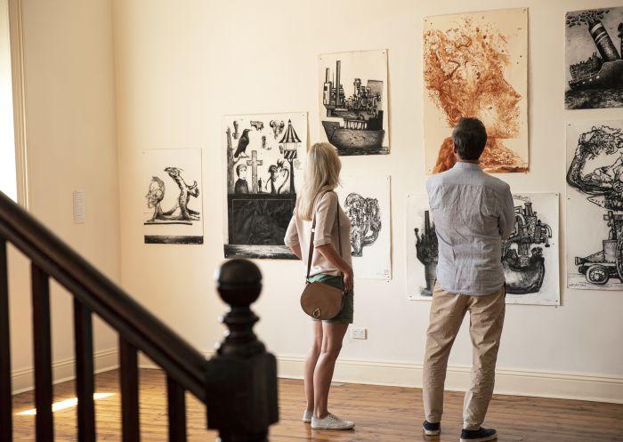 Couple enjoying a visit to the Broken Hill City Art Gallery in Broken Hill, Outback NSW