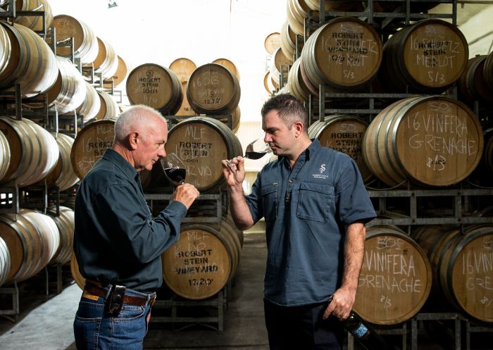 Winemakers Robert and Jacob Stein sampling their wine, Mudgee