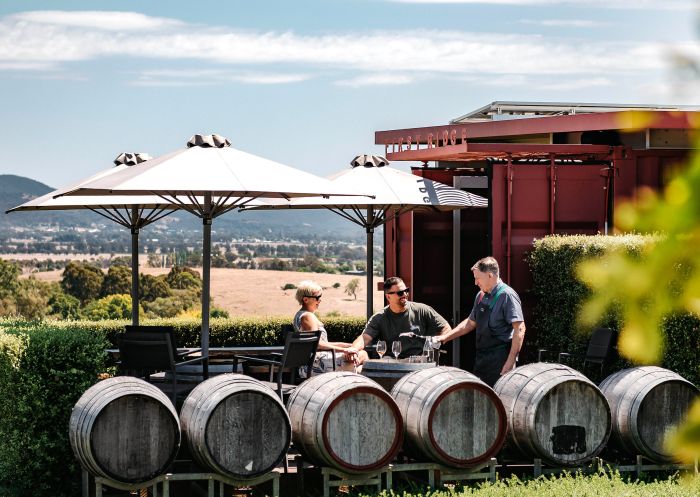 Couple enjoying outdoor wine tasting at First Ridge Wines, Mudgee