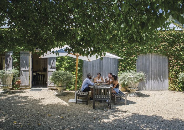 Friends enjoying a lunch and wine at Krinklewood Biodynamic Winery, Broke in the Hunter Valley