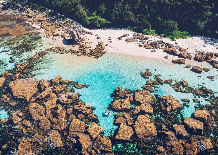 Aerial view of people swimming at Mollymook Bogey Hole, Mollymook