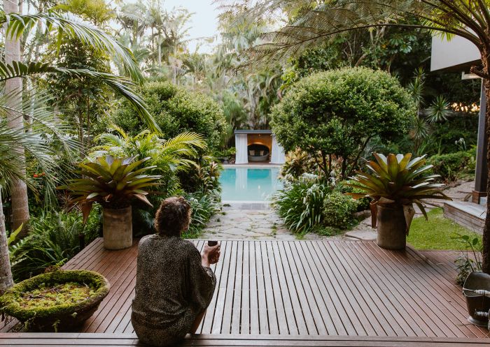 Man enjoying solitude in nature at Gaia Retreat and Spa, Byron Bay