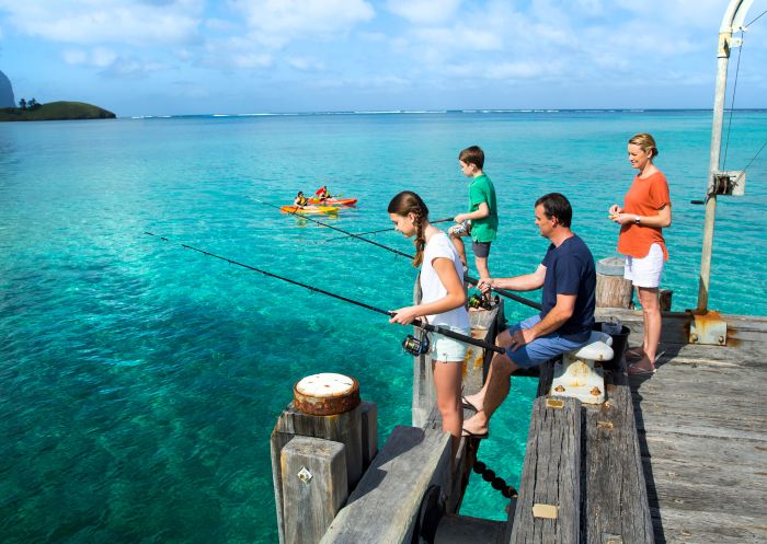 Family enjoying a day of fishing Lord Howe Island Wharf, Lord Howe Island