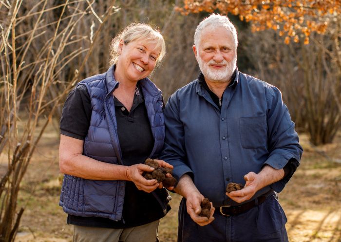 Owners Peter and Kate Marshall with their freshly dug truffles - Terra Preta Truffles - Braidwood