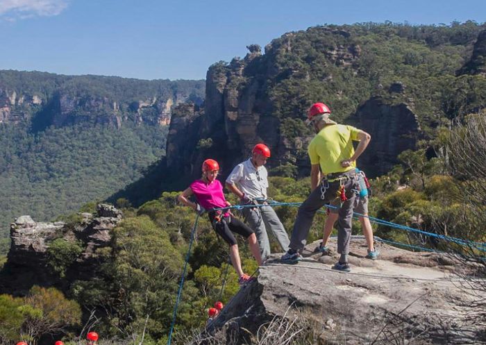  Group enjoying abseiling experience with Australian School of Mountaineering, Katoomba