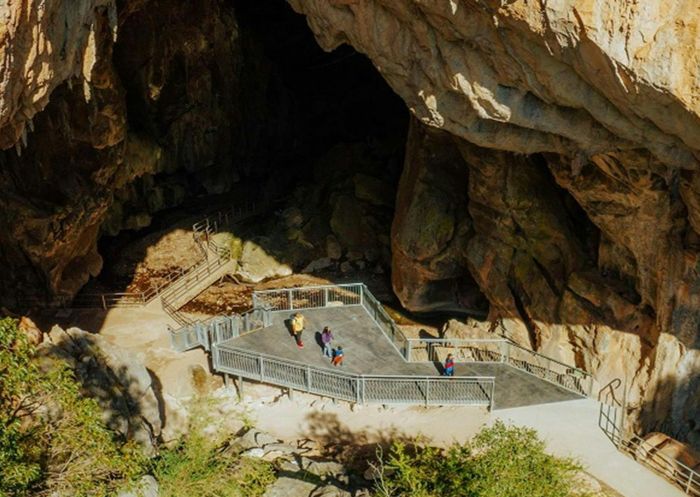 Family walking  in the Victoria Arch accessible platform at Wombeyan Karst Conservation Reserve, Wombeyan Caves