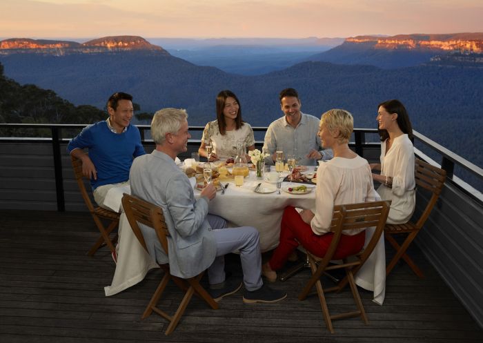 Friends enjoy a dining experience at Echo's Boutique Hotel, Blue Mountains