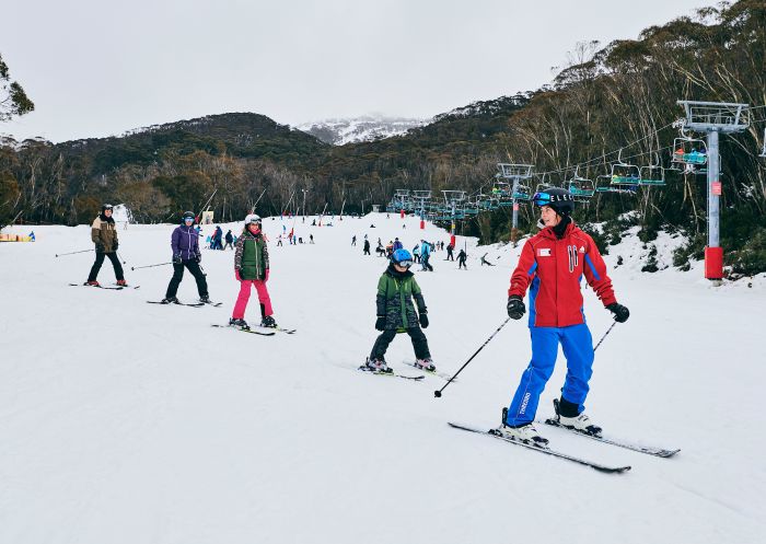 Family learning how to ski with the instructor, Thredbo in the Snowy Mountains