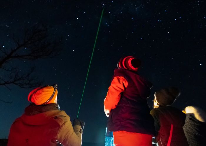 Tour guide pointing a laser to the stars with Blue Mountains Stargazing, Wentworth Falls
