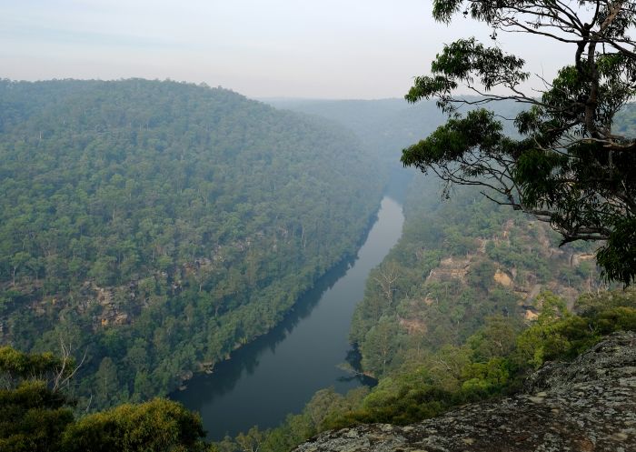 View of Nepean River from unfenced Neapean Lookout, on a hazy day in the Glenbrook area, Blue Mountains National Park