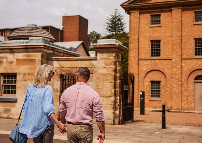 Couple enjoying a visit to the Hyde Park Barracks, Sydney