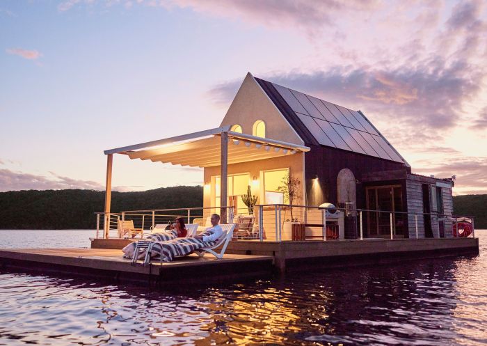 Couple enjoying sunset view at Lilypad, Palm Beach