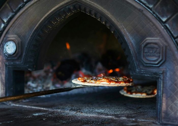 Pizza from the wood fire oven at Four Winds Vineyard Cellar Door, Murrumbateman