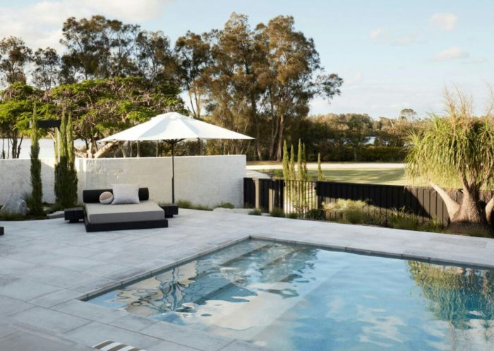 Outdoor pool area at Micalo, Yamba