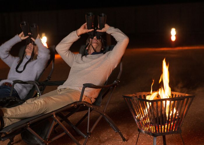 Couple enjoying a sky show at Outback Astronomy, Broken Hill