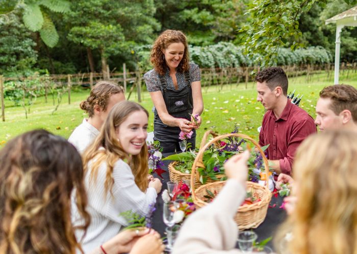 Friends enjoying botanical food and wine at Firescreek Winery, Holgate