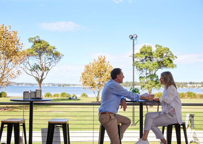 Couple enjoying a coffee at Table 1 Espresso, Speers Point