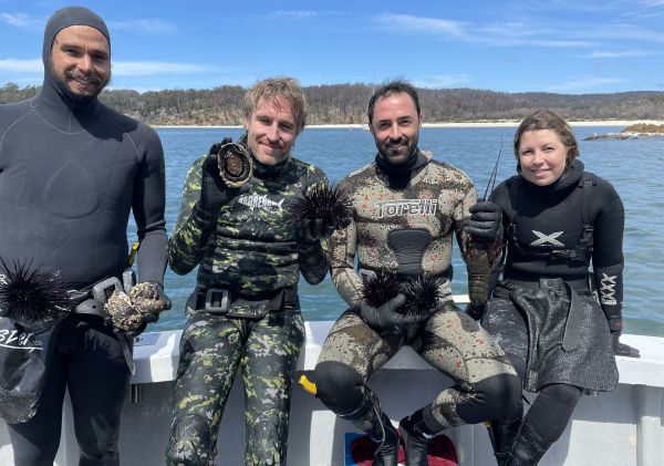 Jayden from Dive Eden with the Three Blue Ducks