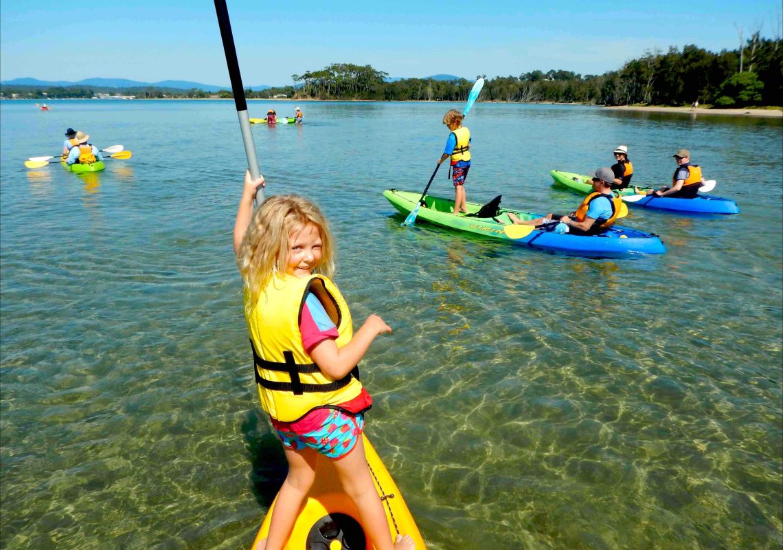 Family enjoying a kayak tour at Batemans Bay