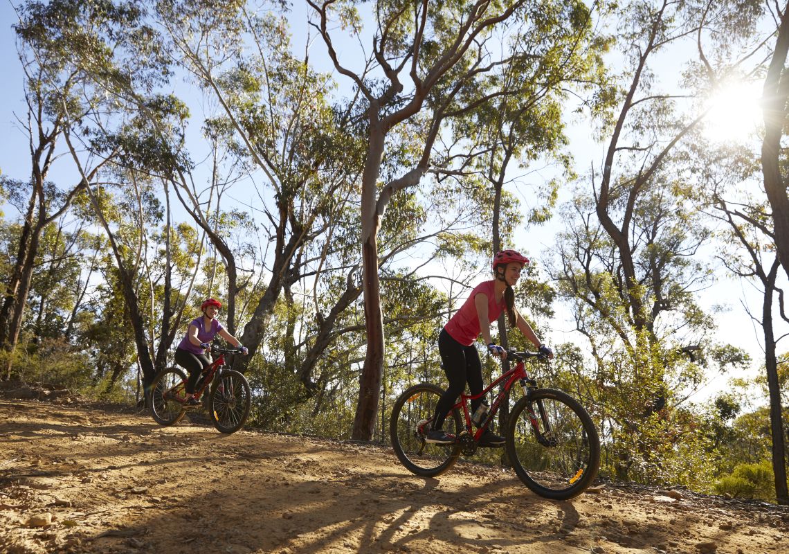 Mother and daughter enjoying a day of mountain biking in the Blue Mountains National Park, Blue Mountains