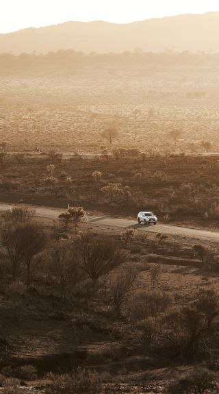 Car driving through the Outback near Broken Hill