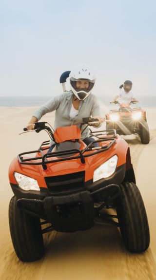 Quad biking experience on the Stockton Sand Dunes in the Worimi Conservation Lands, Port Stephens