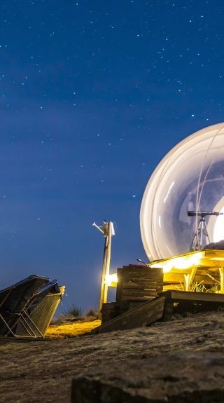 Bubbletent Australia luxury glamping accommodation under the night sky in the Capertee Valley