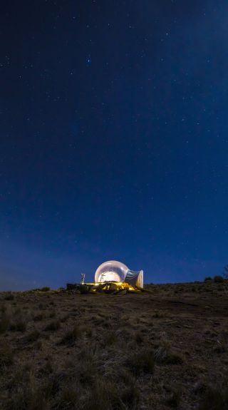 Bubbletent Australia luxury glamping accommodation under the night sky in the Capertee Valley