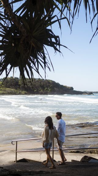 Couple enjoying a day out at Yamba Main Beach in Yamba, North Coast