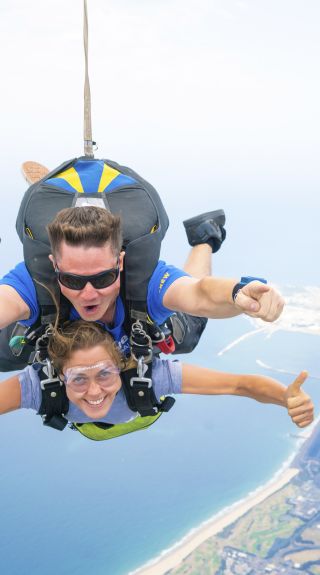Woman enjoying a skydiving experience with Skydive, Wollongong