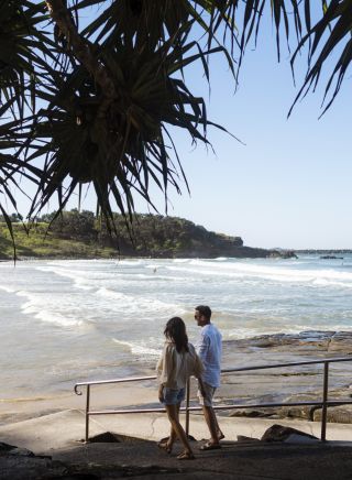 Couple enjoying a day out at Yamba Main Beach, Yamba