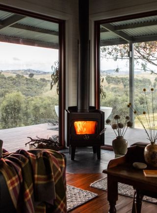 View of fireplace at Kestrel Nest Eco Hut, Mount Adrah