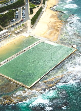 Aerial overlooking Merewether Ocean Baths at Merewether, Newcastle